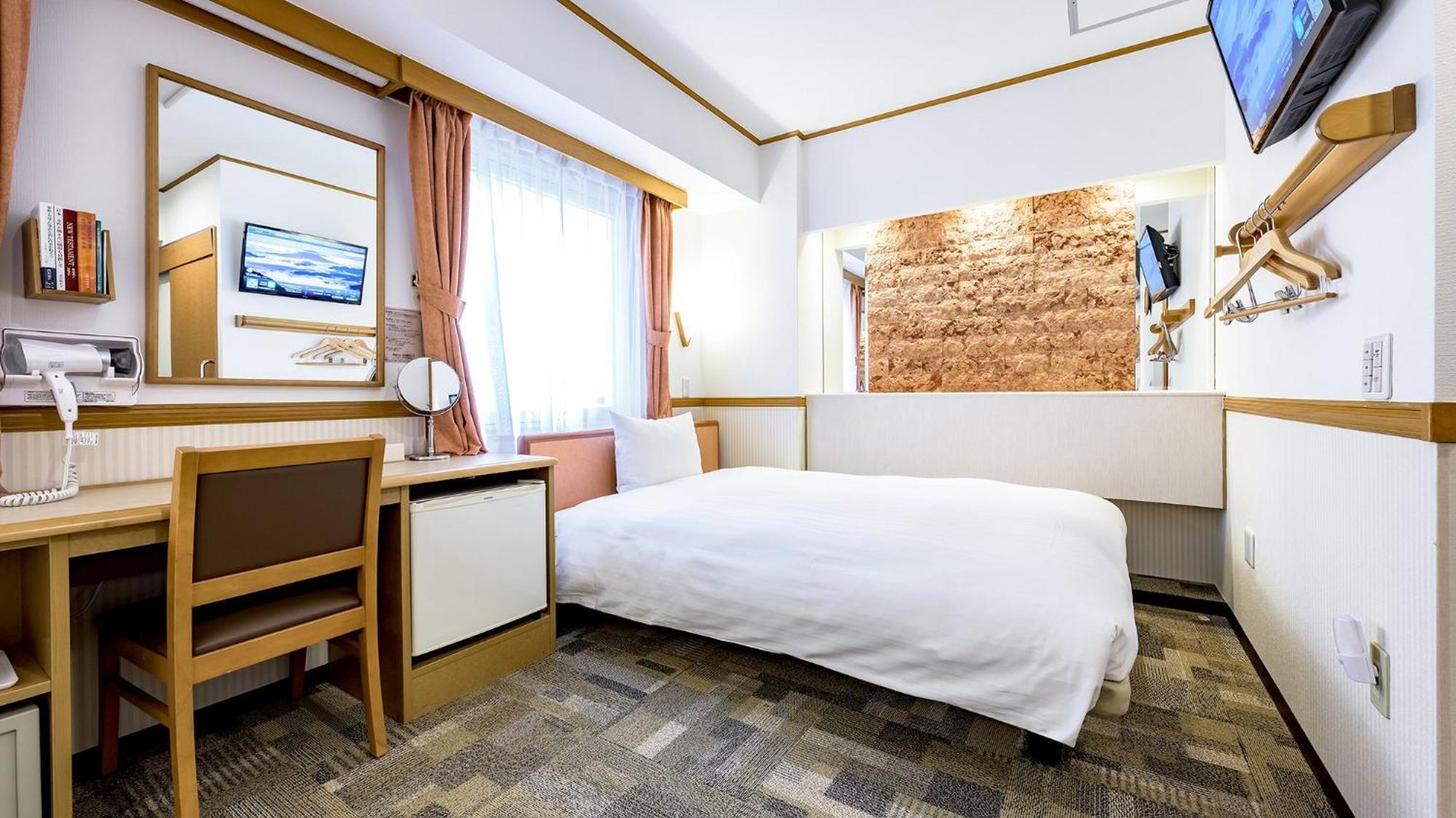Toyoko Inn Takasaki Eki Nishi Guchi No 1 Rum bild