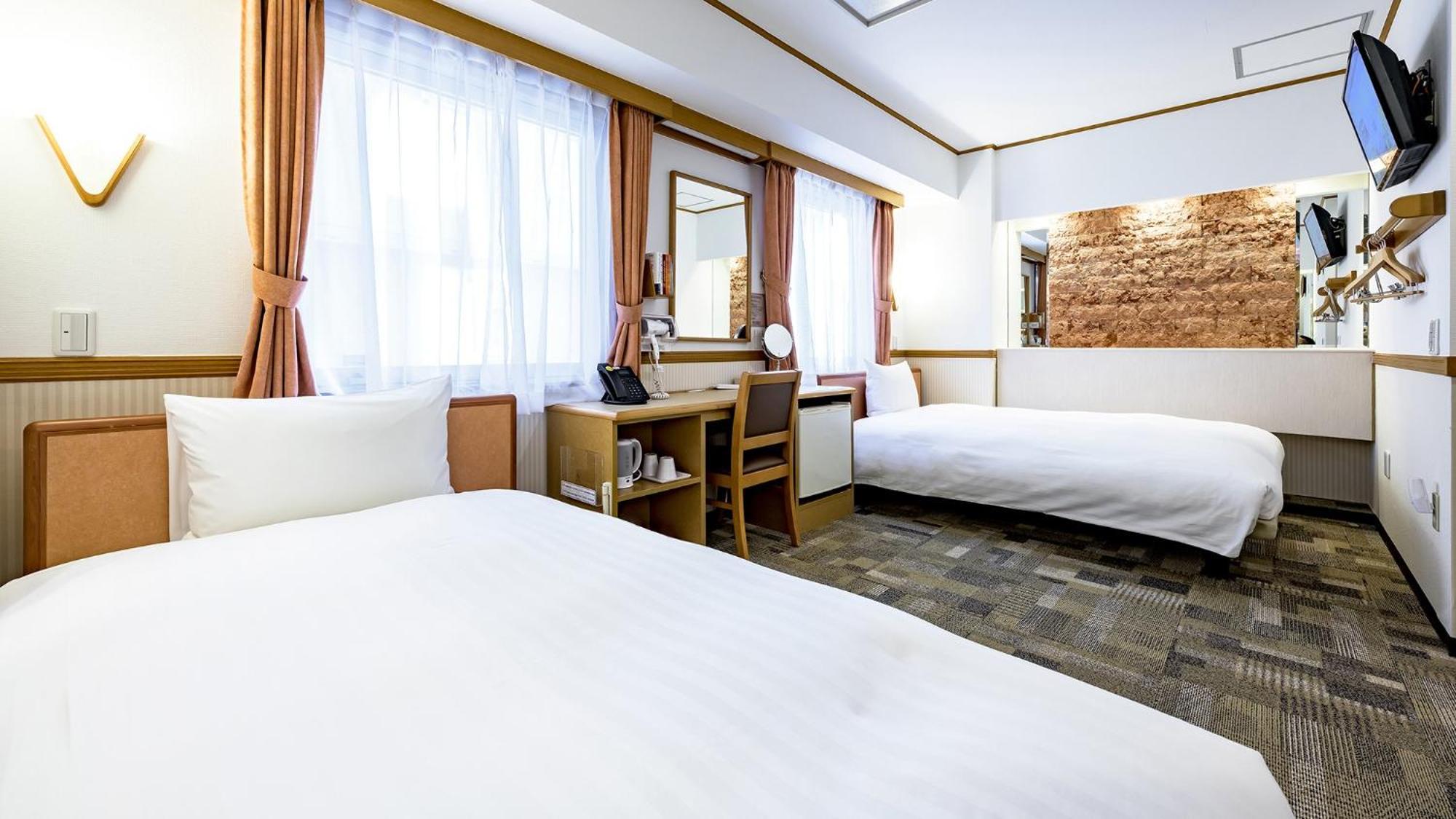 Toyoko Inn Takasaki Eki Nishi Guchi No 1 Rum bild